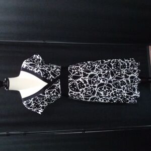 White House Black Market -  Black and white v-neck dress size large